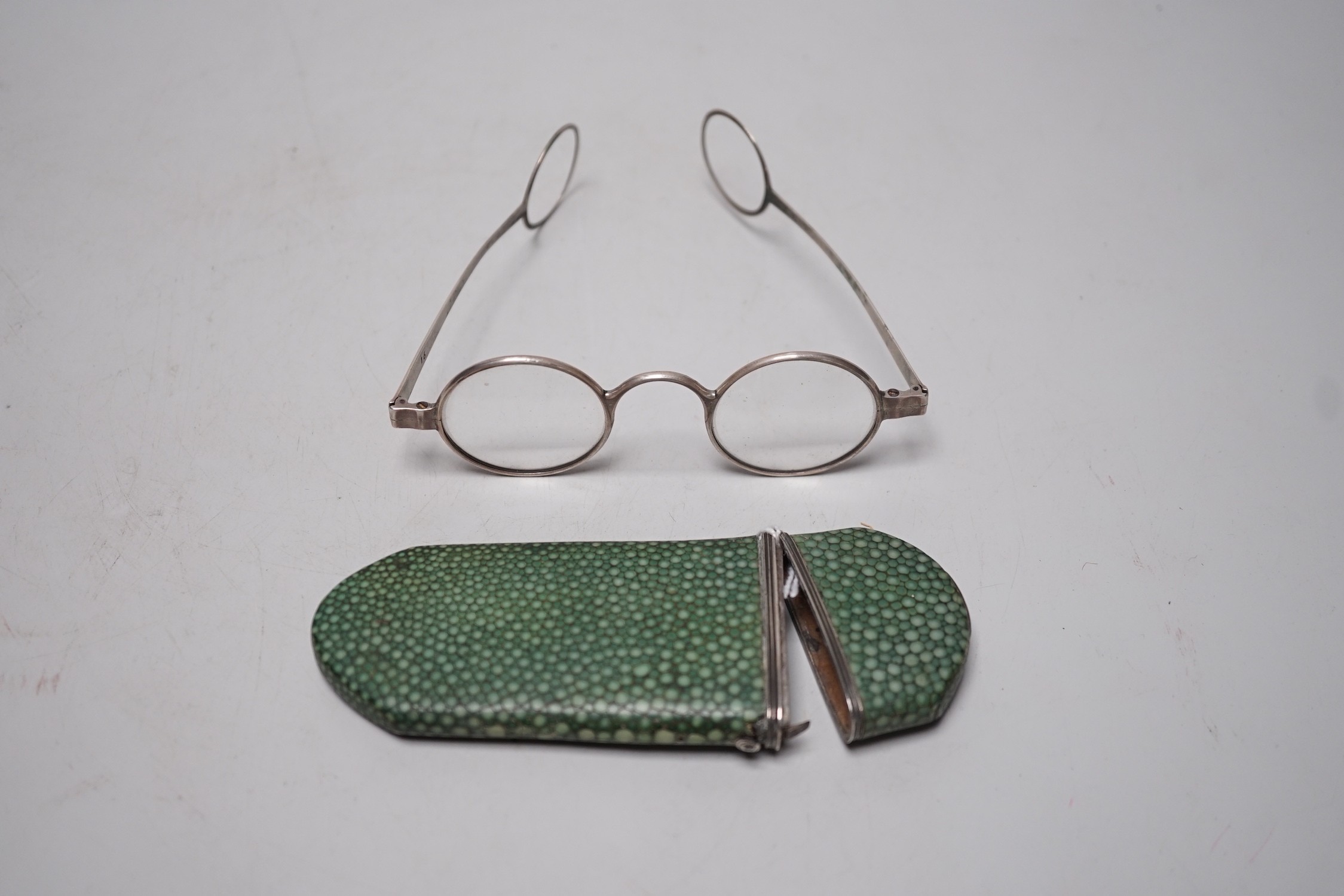 A 19th century shagreen spectacle case and spectacles